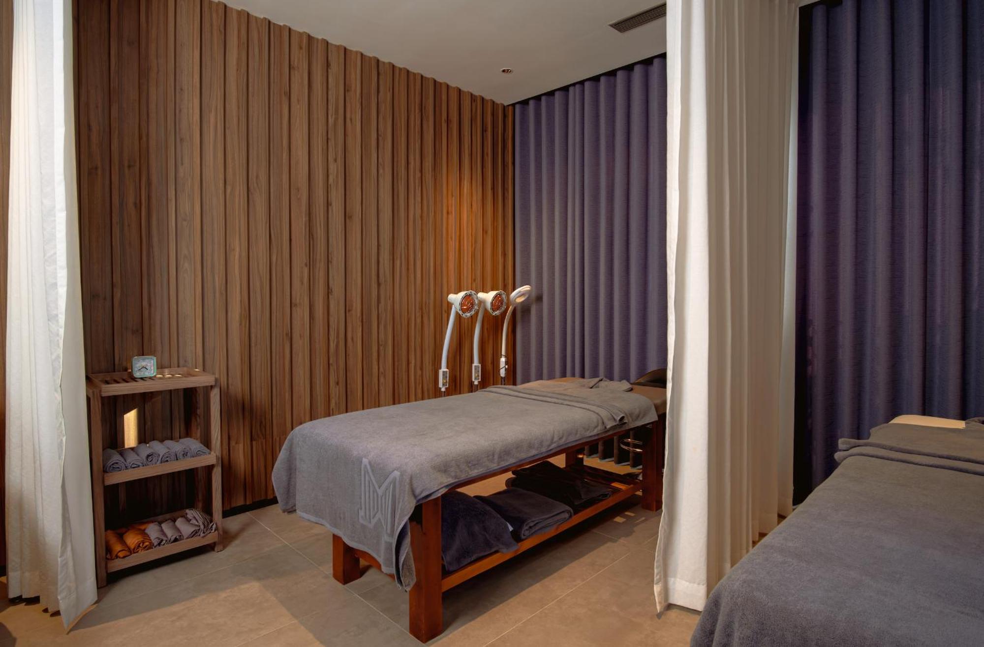 M Hotel Danang Bagian luar foto A massage room at a spa